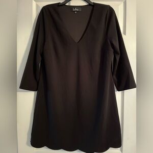Lulu’s long sleeve black dress with scalloped hem. Size M.